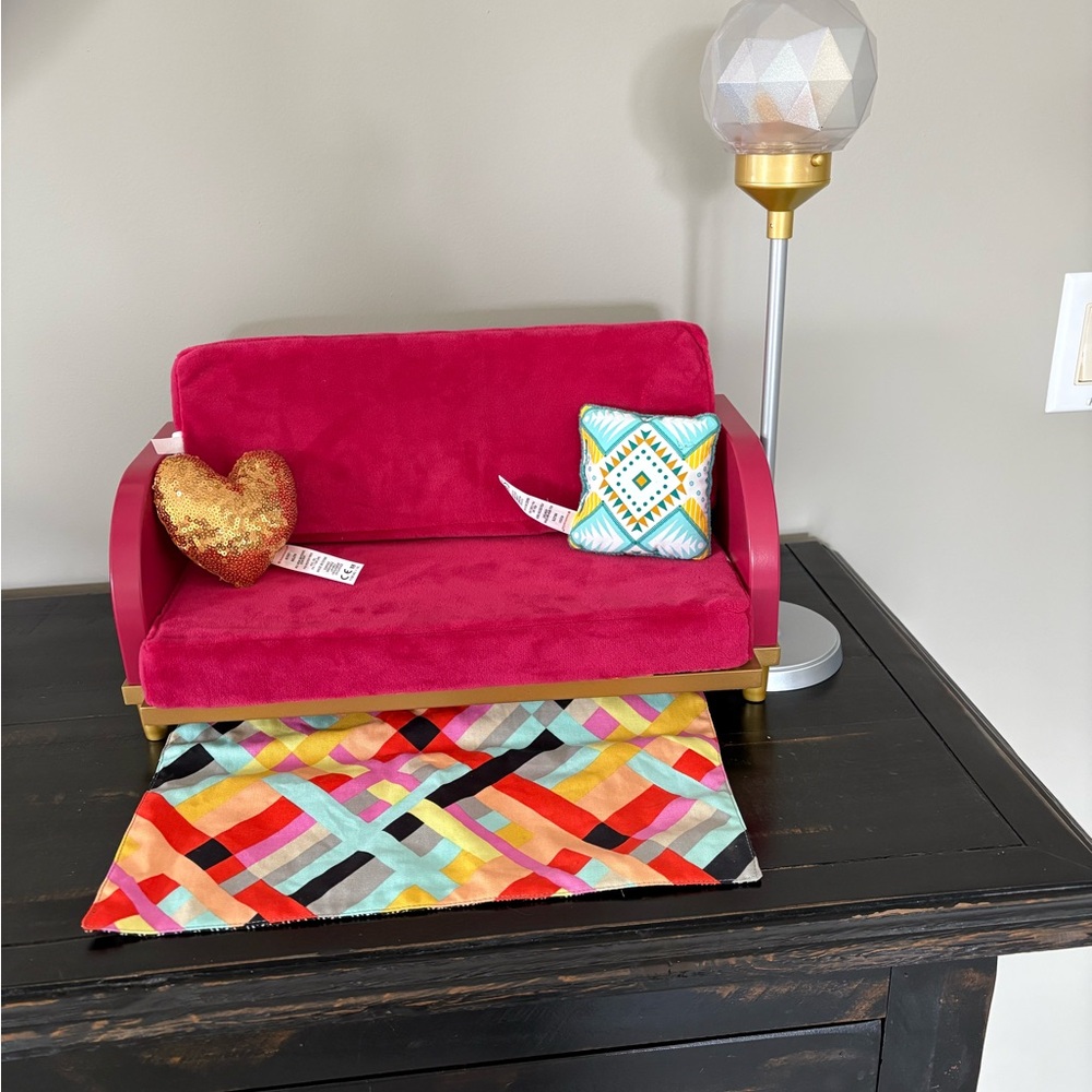American Girl world by us sofa